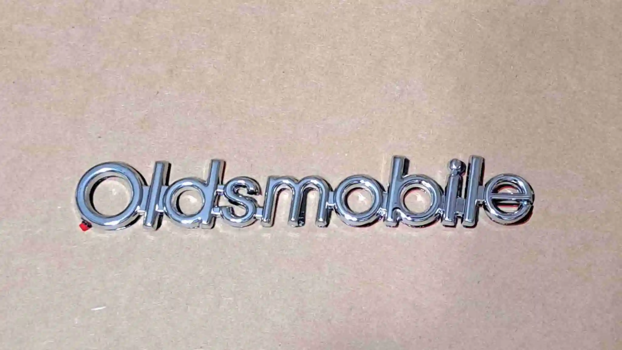 1986-1988 Cutlass Header Panel "Oldsmobile" Emblem