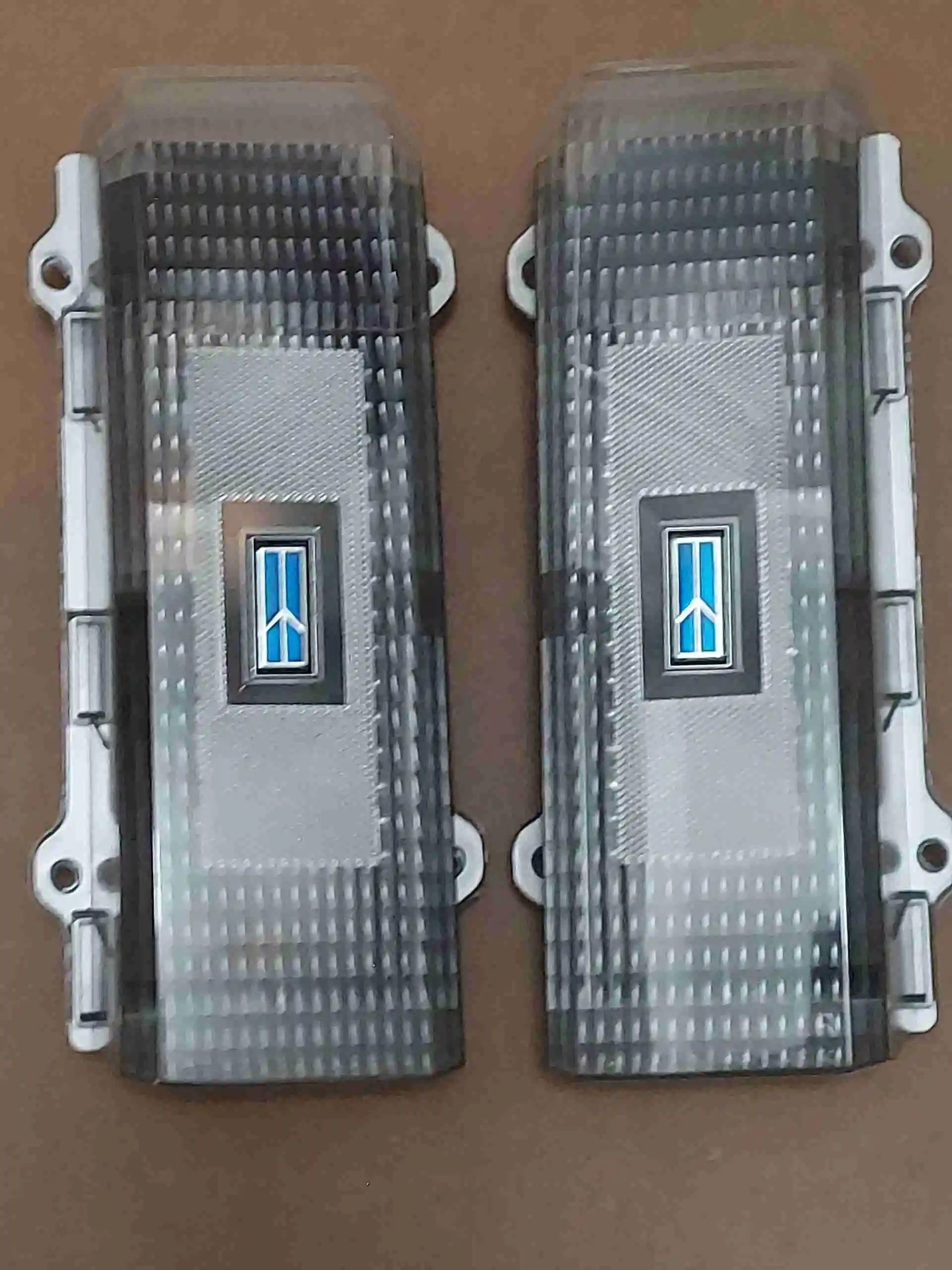 1983-1988 Cutlass Custom Clear Tail Lights with Custom Blue Center Rocket Emblem